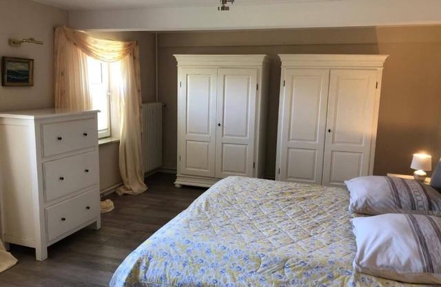 Holiday Home "Großes Reetdachhaus Langenhorn" with Garden, Terrace & Wi-Fi