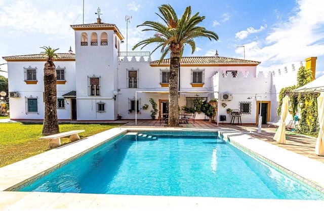 Holiday Home "Hacienda El Corchuelo en Marchena" with Pool, Garden & Wi-Fi