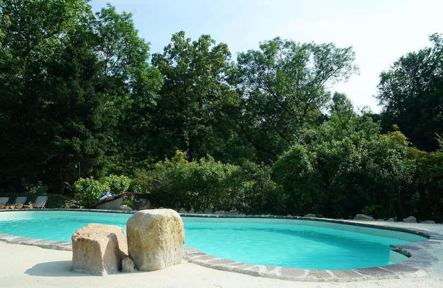 Holiday home in a former mill from the 18th century. With 10 000 m² of land and pool