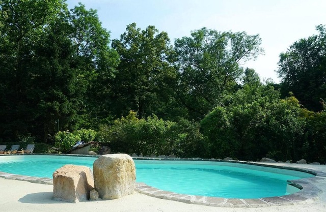 Holiday home in a former mill from the 18th century. With 10 000 m² of land and pool