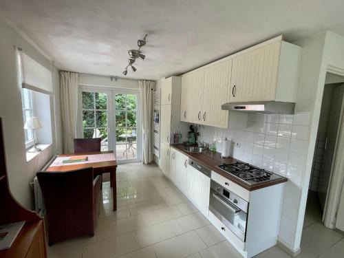 Holiday Home in Spijk with Meadow Views, cleaning included