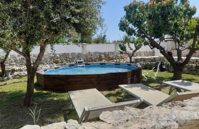 Holiday Home 'La Casetta Del Pescatore' with Shared Pool, Wi-Fi and Air Conditioning