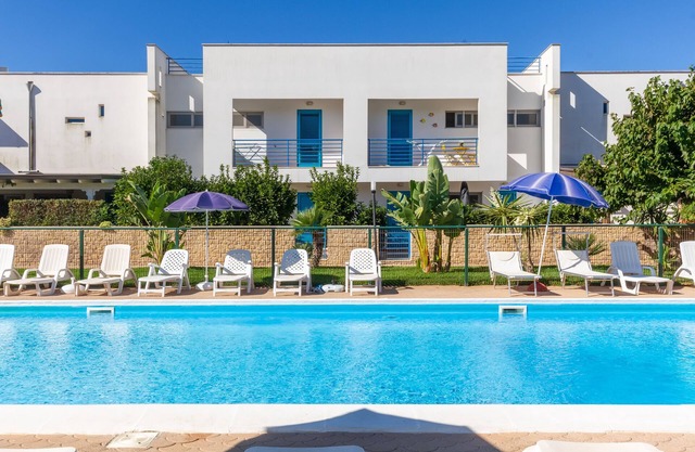 Holiday Home 'Libeccio Luxury Torre Lapillo' with Sea View, Shared Pool and Wi-Fi