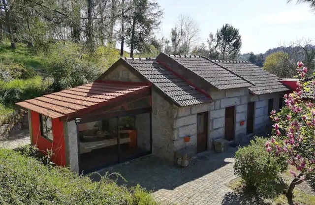 Holiday Home 'Casa De Andrães Camélias' with Shared Pool, Wi-Fi and Air Conditioning