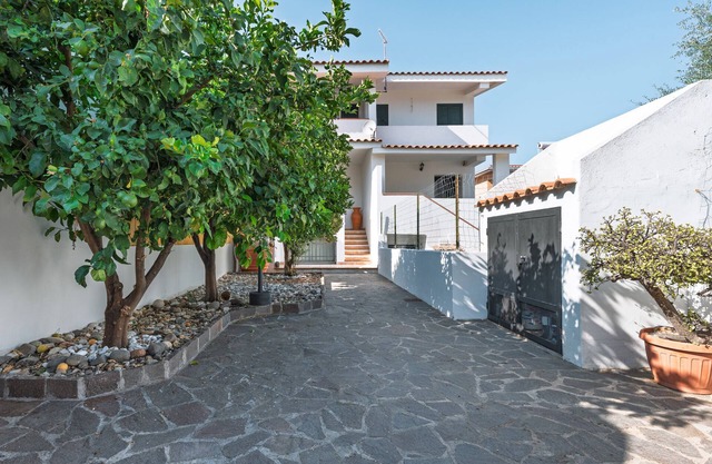 Holiday Home 'Residenza Mediterranea' with Sea View, Garden, and Air Conditioning