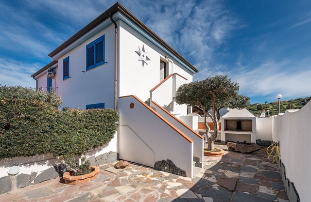 Holiday Home "Sottotorre 2" close to the Sea with Private Garden & A/C