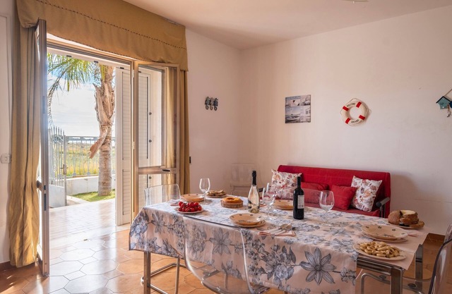 Holiday Home 'Villetta Privata Hoana Sul Mare' with Sea View, Garden and Air Conditioning