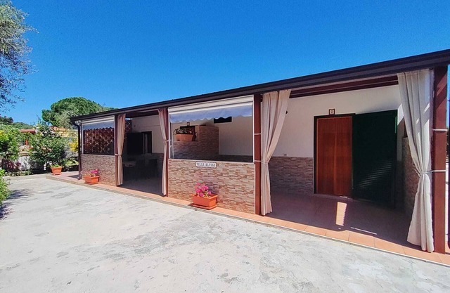 Holiday Home 'Villa Elvira Trilocale' with Private Terrace, Shared Garden and Air Conditioning