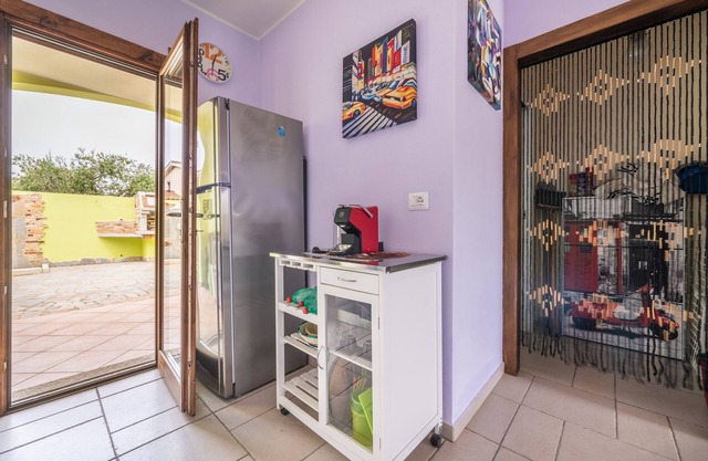 Holiday Home 'Villetta Olia Speccciosa' with Private Garden, Balcony and Air Conditioning