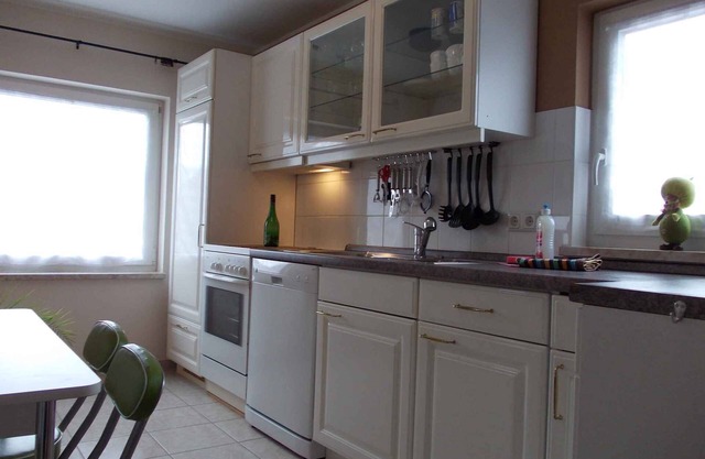 Holiday home with fireplace and barbecue in the garden