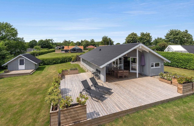 Holiday home with sauna, hot tub and sea view