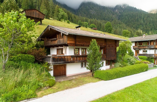 Holiday home with ski storage room and balcony