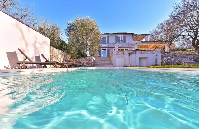 Holiday home with terrace and pool