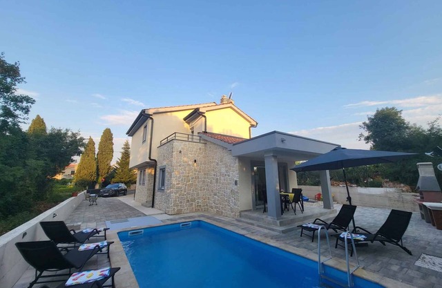 Holiday home with three bedrooms and pool