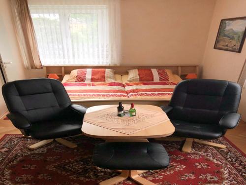 Holiday homes for two people, with a swimming pool, in the Ore Mountains