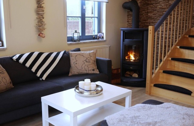 Holiday House 'Hendrijke' on the lagoon in the idyllic Kamminke, Wi-Fi, sauna, fireplace