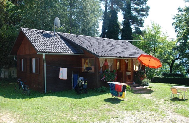 Holzbungalow 1 mit Seeblick - Ferienwohnungen Lipnik