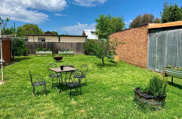 Home away from home - 1930's Brick cottage in Inner North with large garden