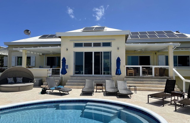 Home with panoramic views with access to private beach!