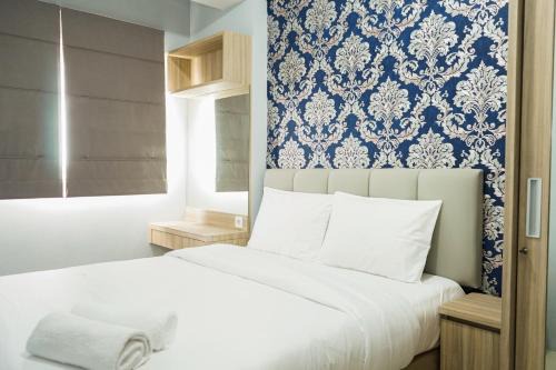 Homey and Comfy 1BR Signature Park Grande Apartment By Travelio
