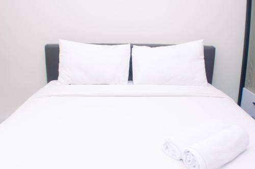 Homey and Minimalist Studio at Vasanta Innopark Apartment By Travelio