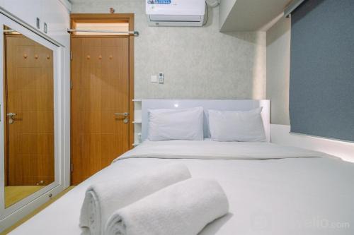 Homey and Simply 2BR Apartment at Cinere Resort By Travelio