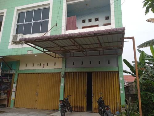 Hotel O Andesta Guest House SyariahNearAgrowisata Sungai Pinang Agro Nadin