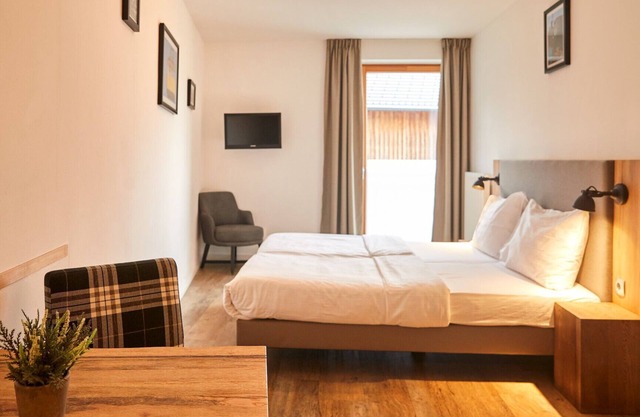 Hotel room with breakfast at Dormio resort Obertraun