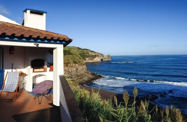 House by the sea with terrace and stunning views.
