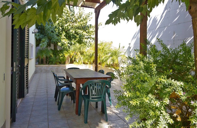 House in the center of Torre Suda 250 mt. from the sea, 7 places, A/C.