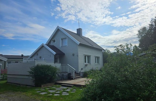House near Reisa national park, Aurora and the Midnight sun