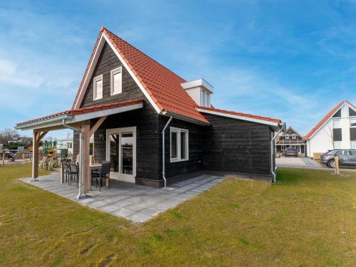 House near Scherpenisse Beach with Garden