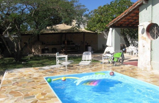 House surrounded porch, 4 bedrooms, pool, barbecue and volleyball court
