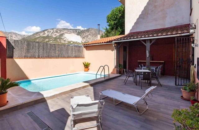 House with barbecue and pool