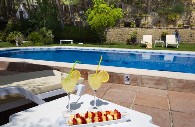House with fireplace, large private gardens and swimming pool, Ronda, Spain.