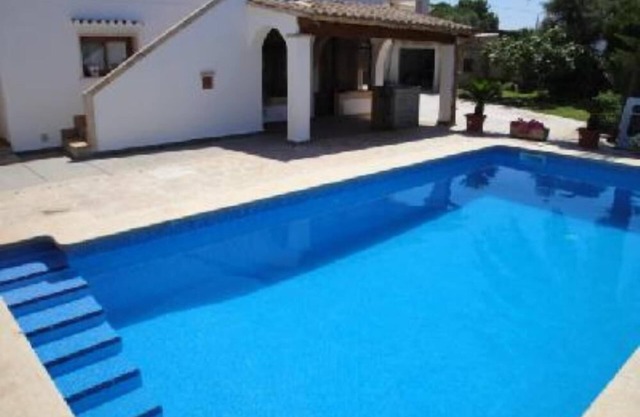 House with garden and pool