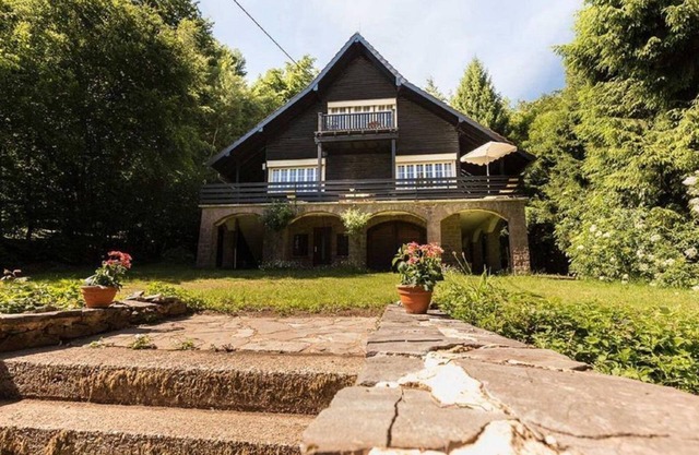 Hunting lodge by the stream