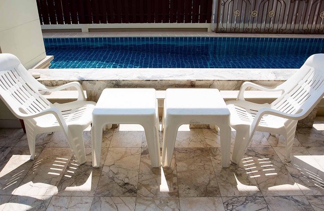 I-Rin poolvilla featuring its own swimming pool set in a private estate.