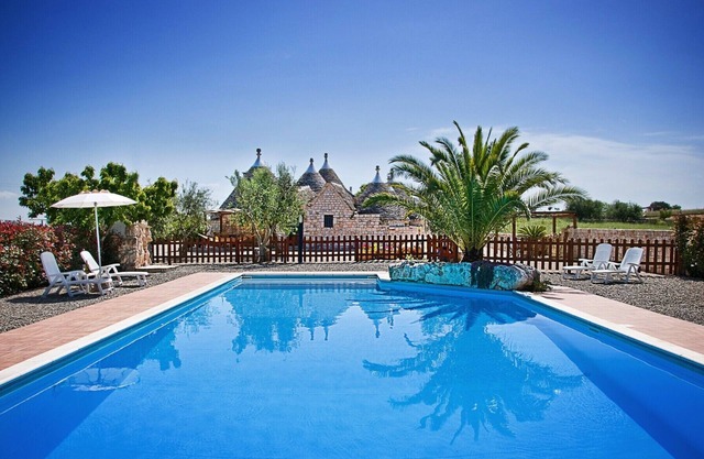 Il Ciliegeto: 1800s trullo house with views of pool, vineyard and Itria Valley