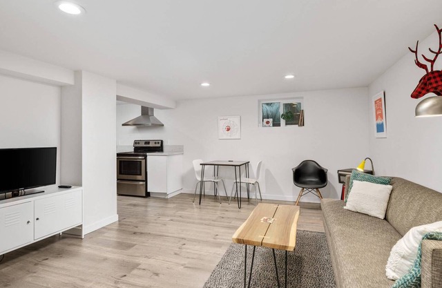 Immaculate Basement Retreat w/ Bright Minimalist Vibes, Close to Food, Art, Shopping & Entertainment