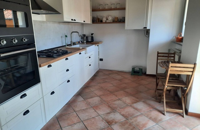 In pieno centro con grande cucina con tutti i confort e 2 camere da letto