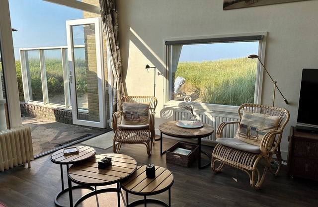 In the middle of the dunes and only 50 m from the beach! The location will enchant you.
