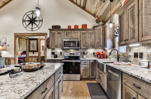 Indulge in romance at French Kisses! This new, pet-friendly cabin offers a hot tub, fire table, and WiFi for an unforgettable getaway