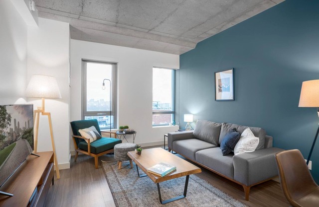 Industrial 1BR near MIT w/Gym, Doorman, Roof Deck