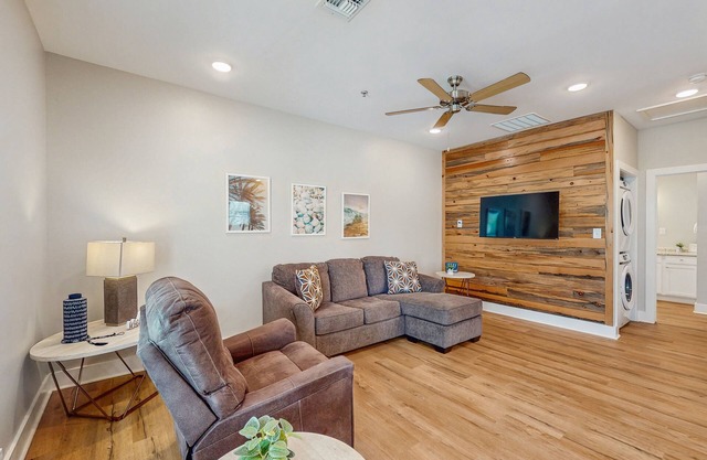 Inviting coastal home with shared pool and stocked pond - steps to the beach