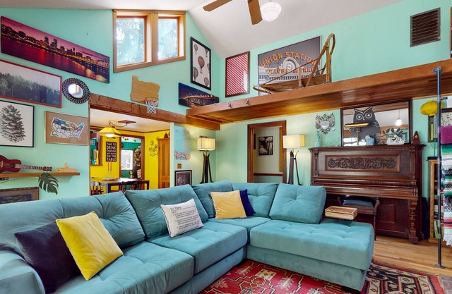 Inviting dog-friendly home with game room, fireplace, balcony, central AC, & W/D