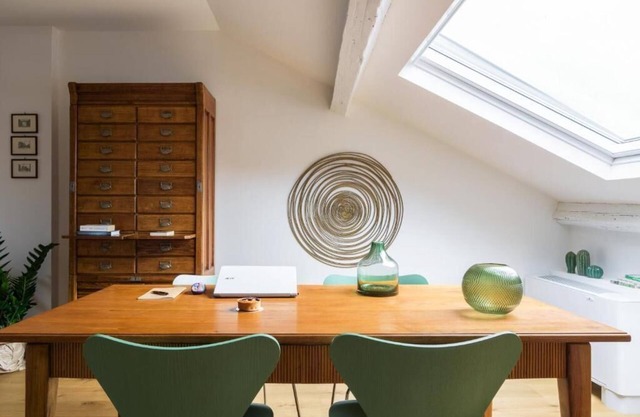It is a newly renovated attic located in a building from the early 1900s