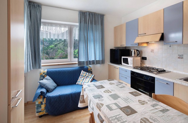Apartment 'Col Di Lana' with Mountain View, Shared Garden and Wi-Fi