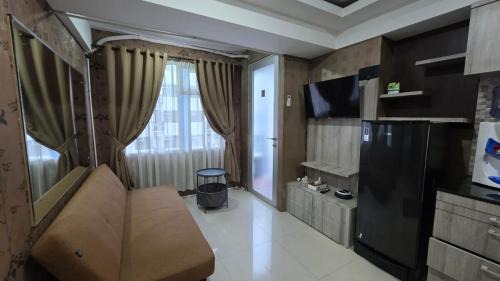 Jarrdin Apartemen 2BR poolview C by NEMUI ROOM
