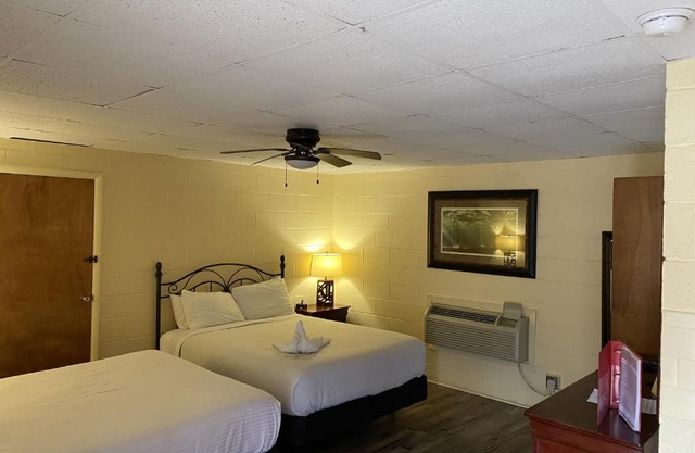 JI9, a Queen Guest Room at the Joplin Inn at entrance to the resort Hotel Room